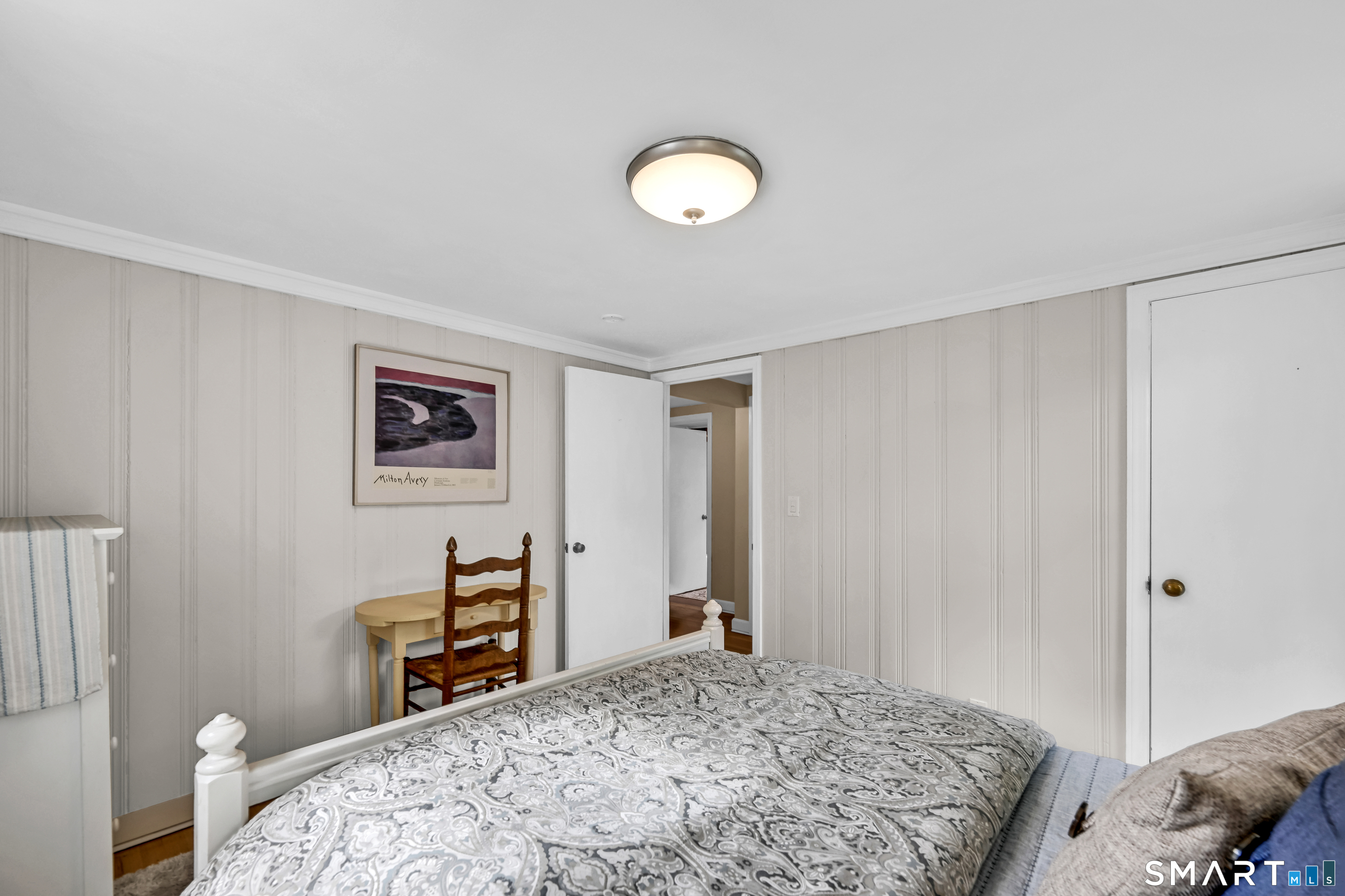 47 Spring Lane West Hartford, CT 06107 - Photo 21 of 38 a bedroom with a bed and a dresser