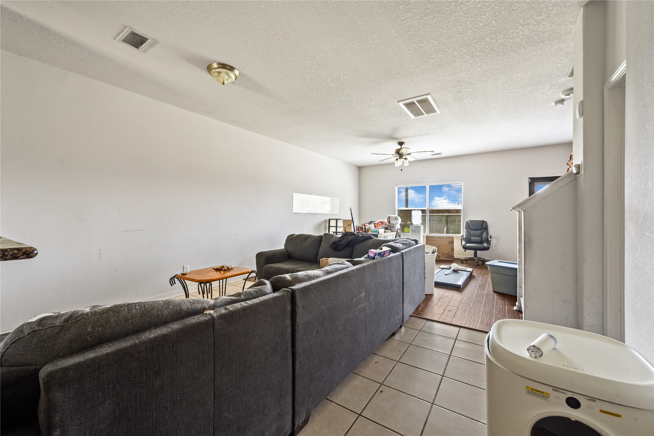 28832 San Bernard River Loop Spring, TX 77386 - Photo 6 of 50 a room with furniture a air conditioner and a window