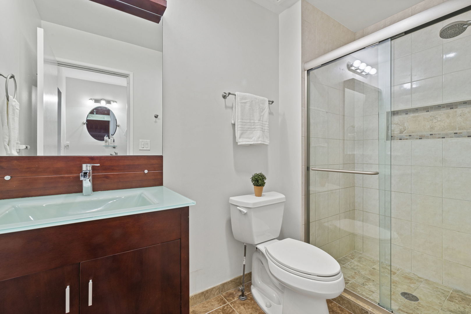 416 Swallow Lane Deerfield, IL 60015 - Photo 14 of 31 a bathroom with a granite countertop sink mirror vanity and toilet