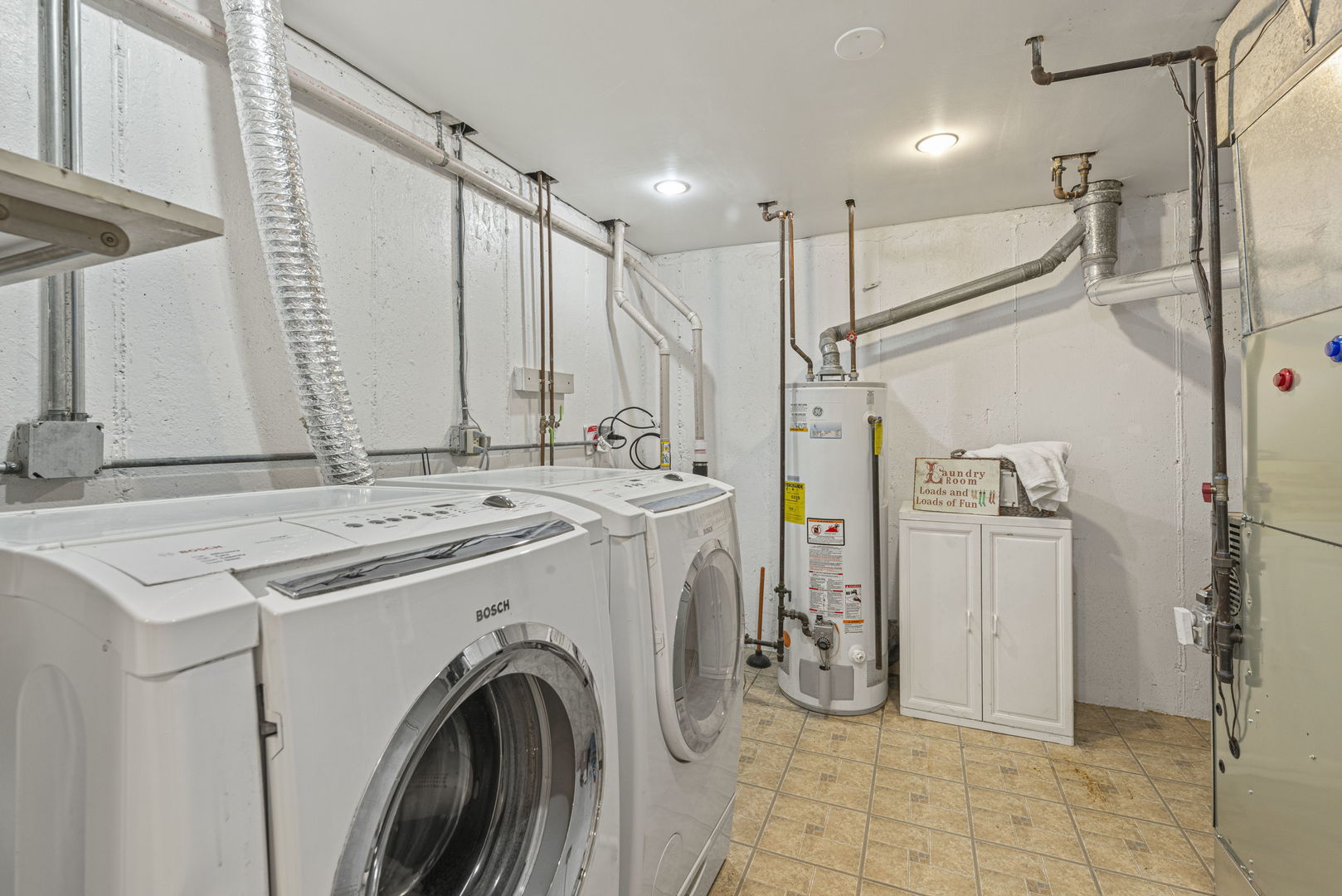 416 Swallow Lane Deerfield, IL 60015 - Photo 22 of 31 a utility room with dryer and washer