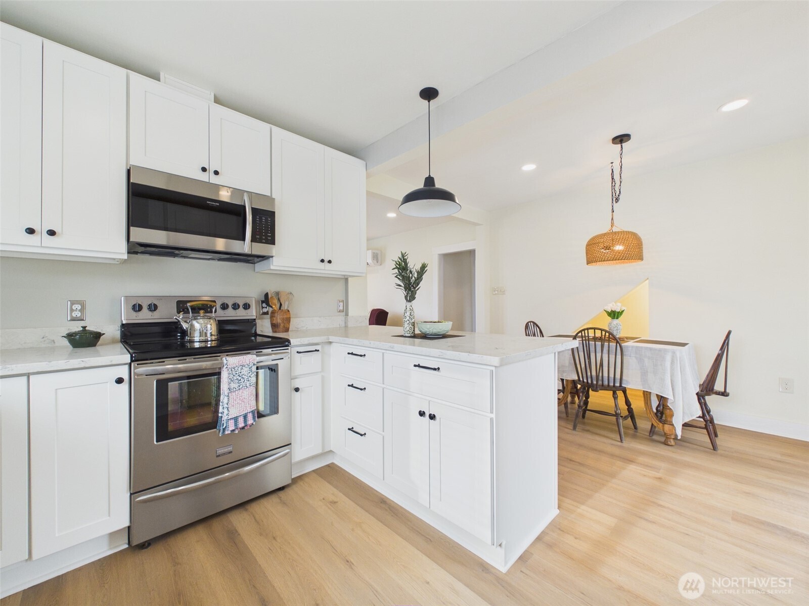481 Kirkland Road Chehalis, WA 98532 - Photo 12 of 40 a kitchen with stainless steel appliances granite countertop a stove a sink and a microwave