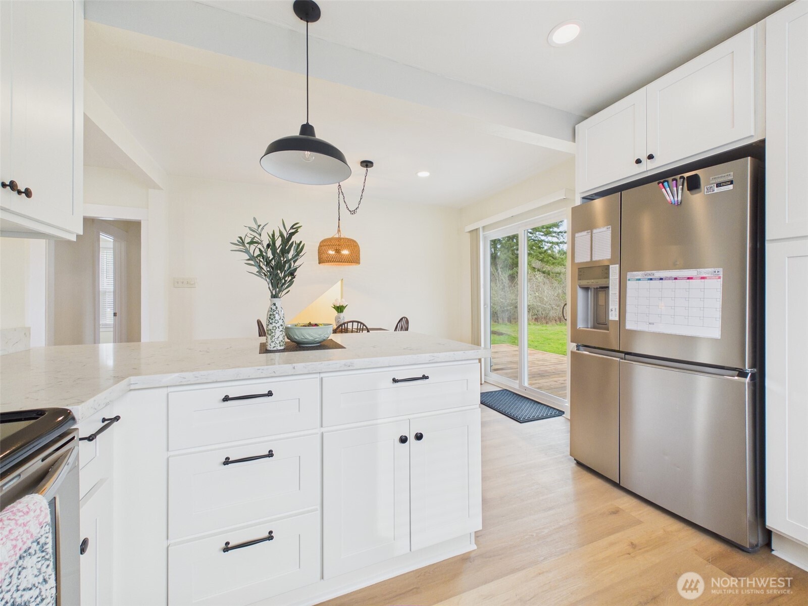481 Kirkland Road Chehalis, WA 98532 - Photo 13 of 40 a kitchen with a refrigerator sink and cabinets