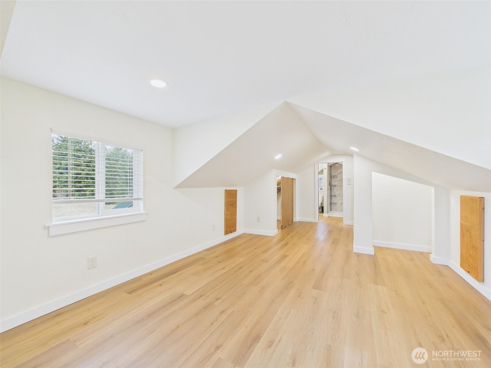 481 Kirkland Road Chehalis, WA 98532 - Photo 22 of 40 a view of empty room with wooden floor and fan