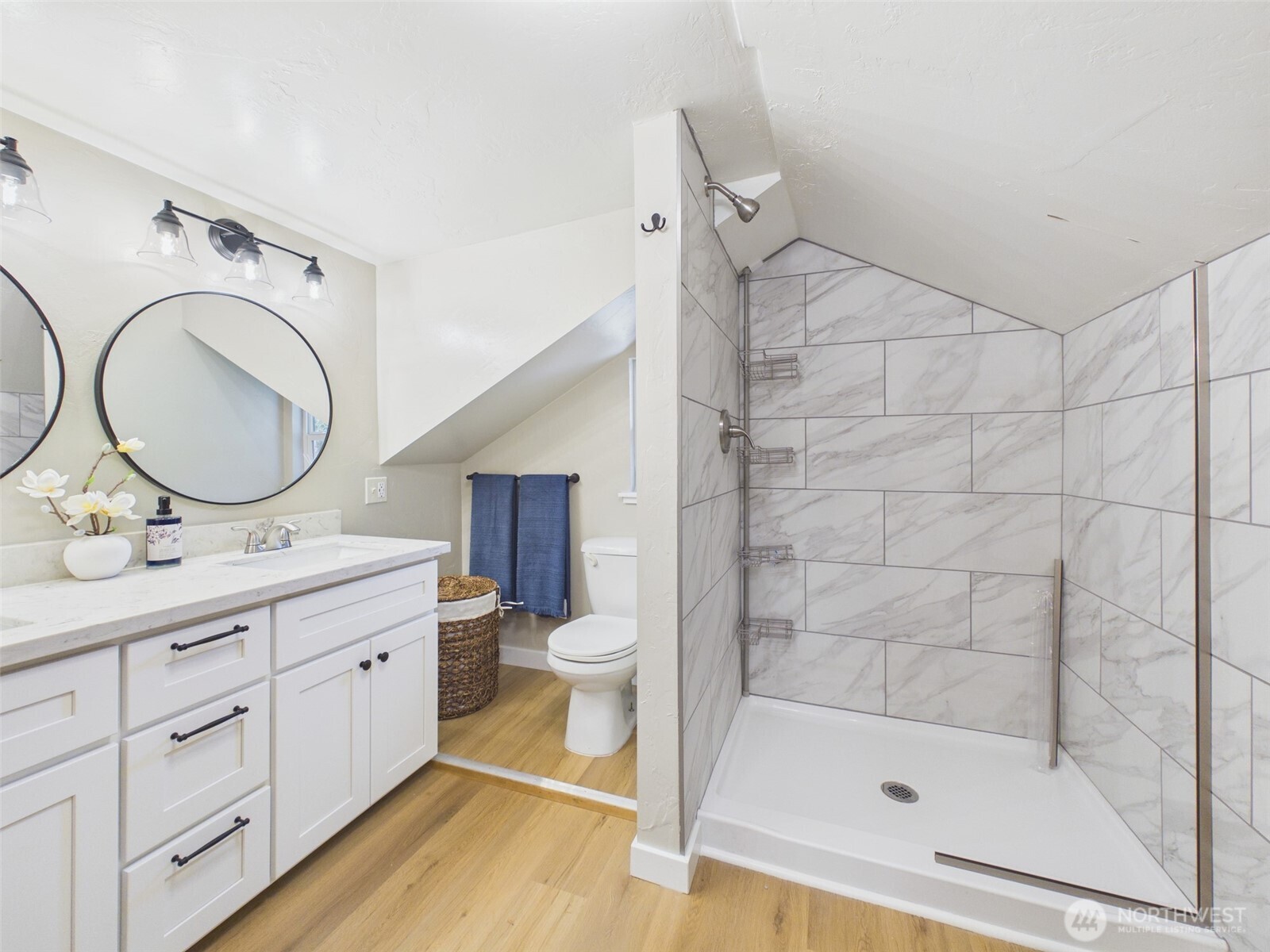 481 Kirkland Road Chehalis, WA 98532 - Photo 25 of 40 a bathroom with a granite countertop sink a mirror and a shower
