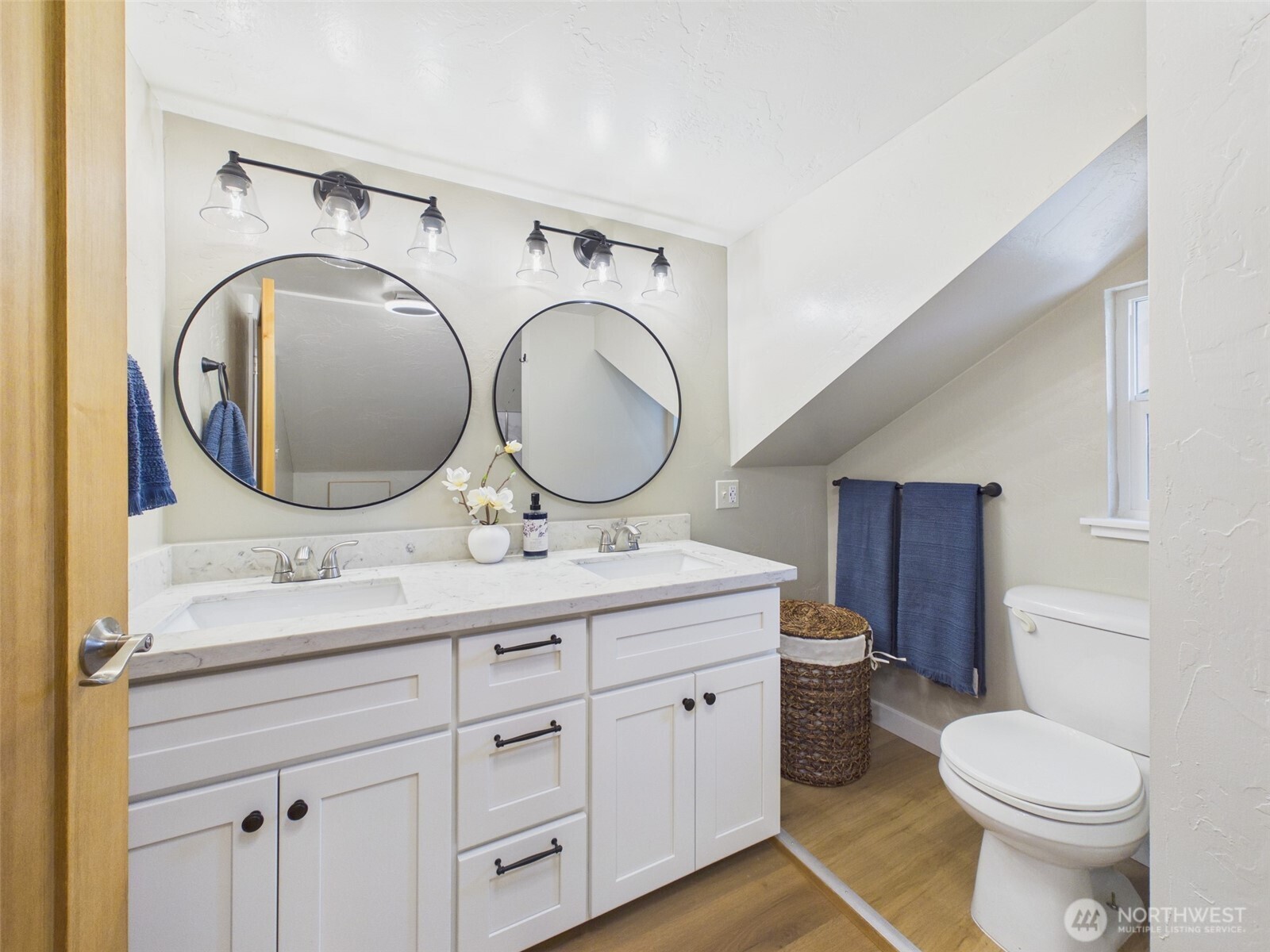 481 Kirkland Road Chehalis, WA 98532 - Photo 27 of 40 a bathroom with a toilet sink and mirror
