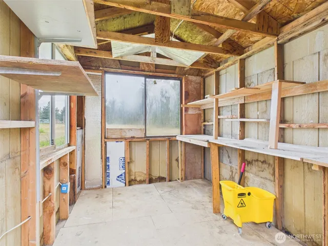 a view of wooden fence and trees