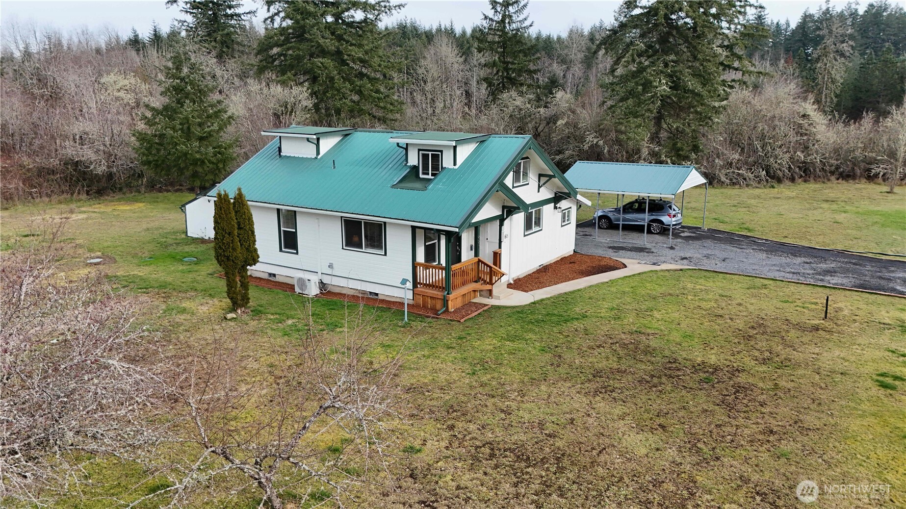 481 Kirkland Road Chehalis, WA 98532 - Photo 39 of 40 an aerial view of a house having patio with a yard