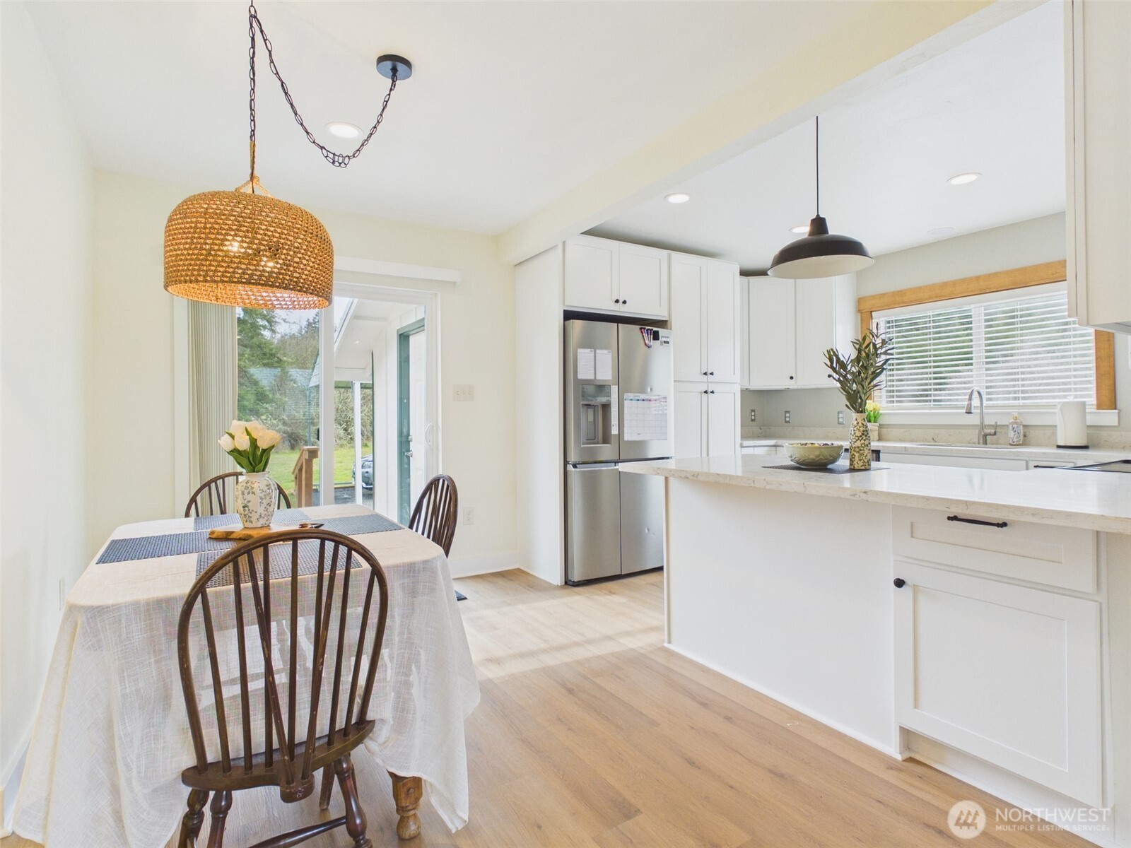 481 Kirkland Road Chehalis, WA 98532 - Photo 5 of 40 a kitchen with stainless steel appliances granite countertop a kitchen island a stove a cabinets a sink and a refrigerator