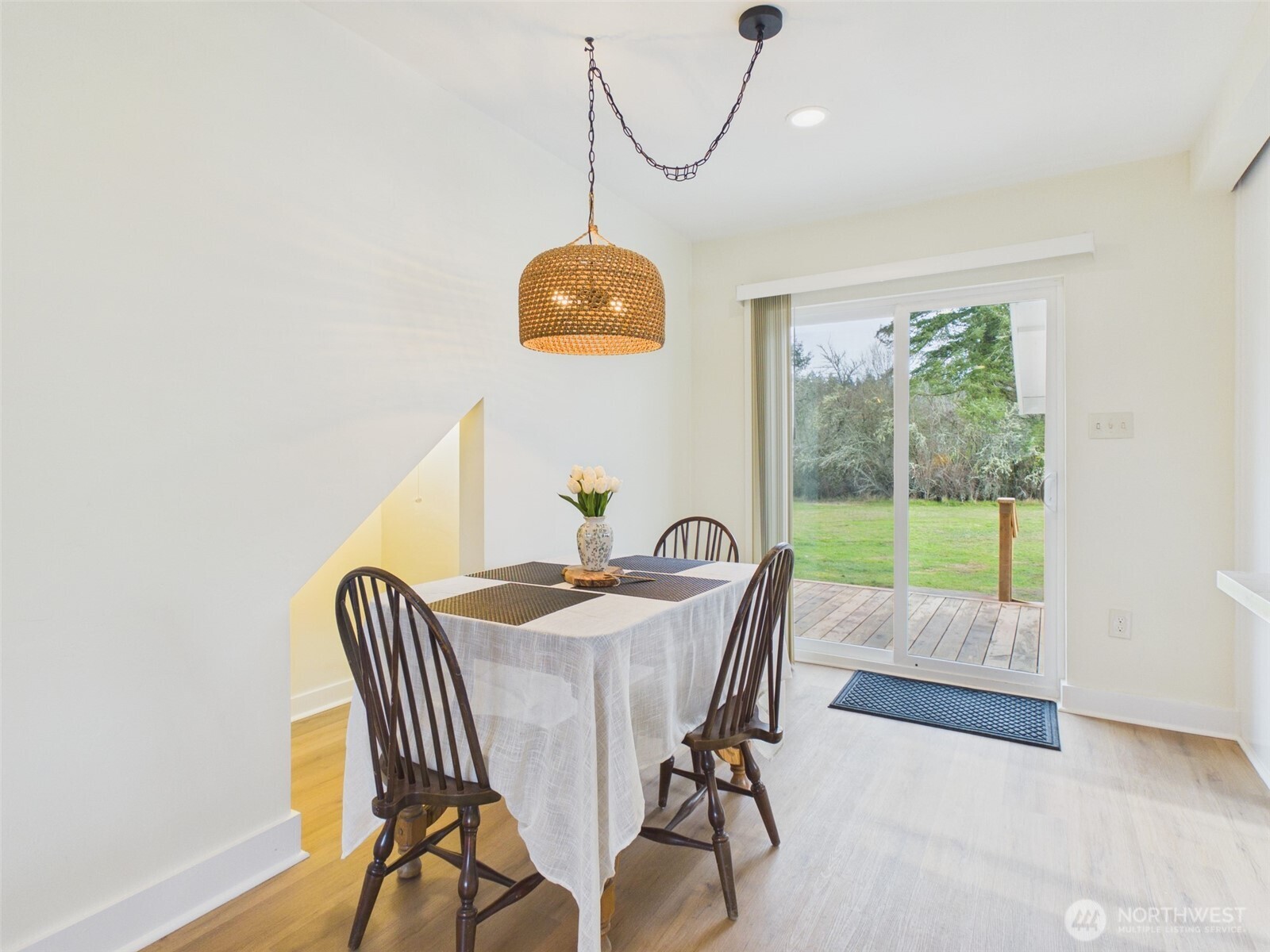 481 Kirkland Road Chehalis, WA 98532 - Photo 6 of 40 a view of a dining room with furniture a chandelier and wooden floor