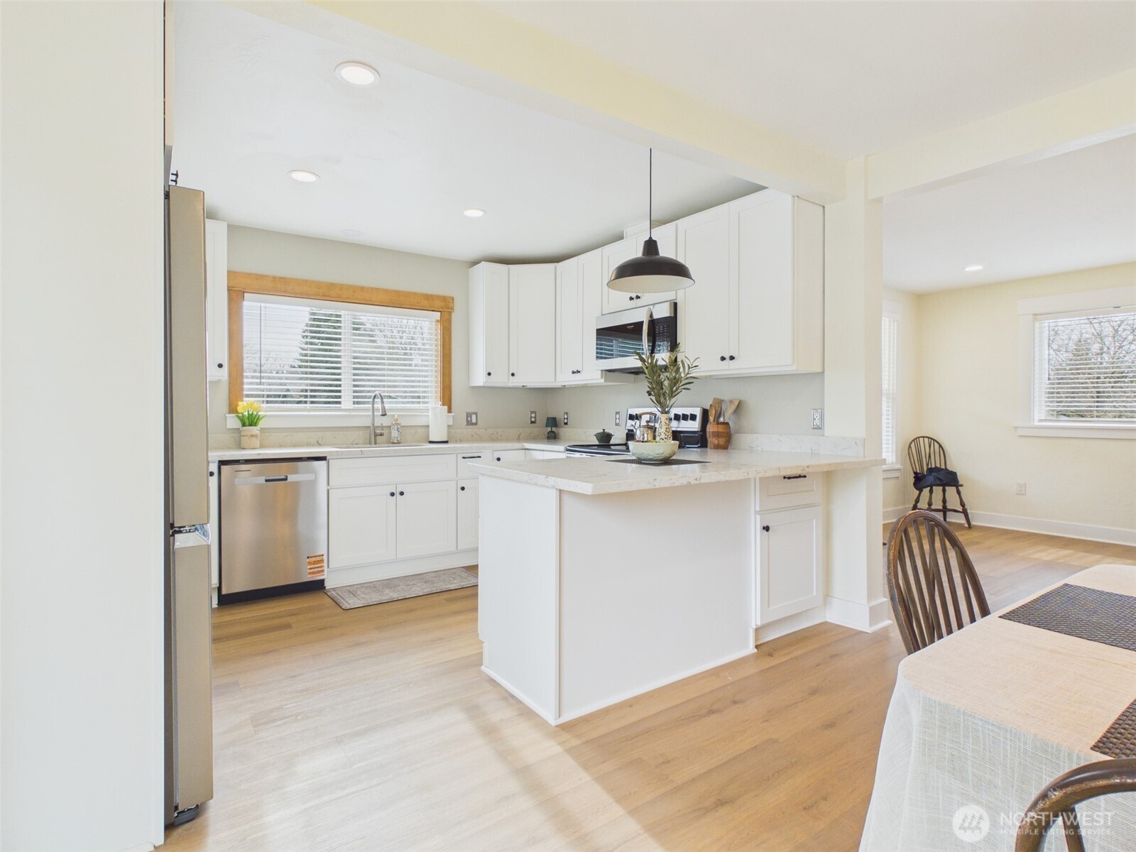 481 Kirkland Road Chehalis, WA 98532 - Photo 7 of 40 a kitchen with white cabinets appliances and a sink