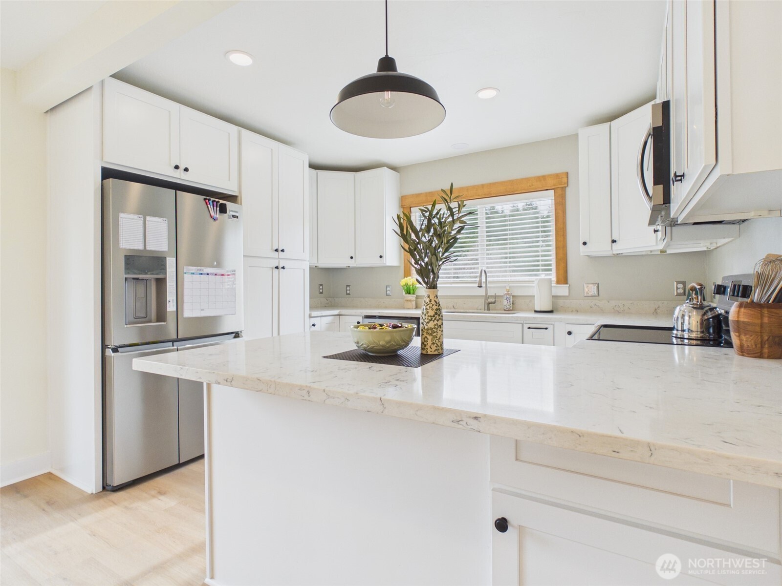 481 Kirkland Road Chehalis, WA 98532 - Photo 8 of 40 a kitchen with stainless steel appliances a sink a stove and a refrigerator
