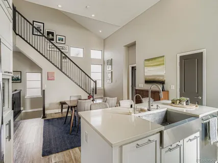 a view of living room with furniture and a table