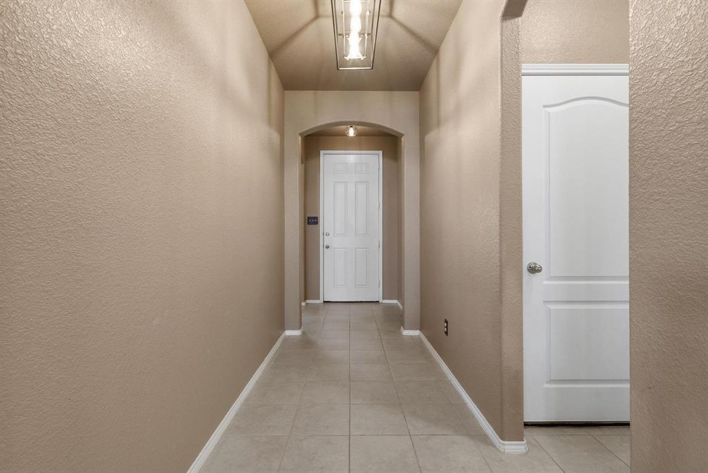 5513 Wharfside Place Denton, TX 76208 - Photo 17 of 37 a view of a hallway with a elevator