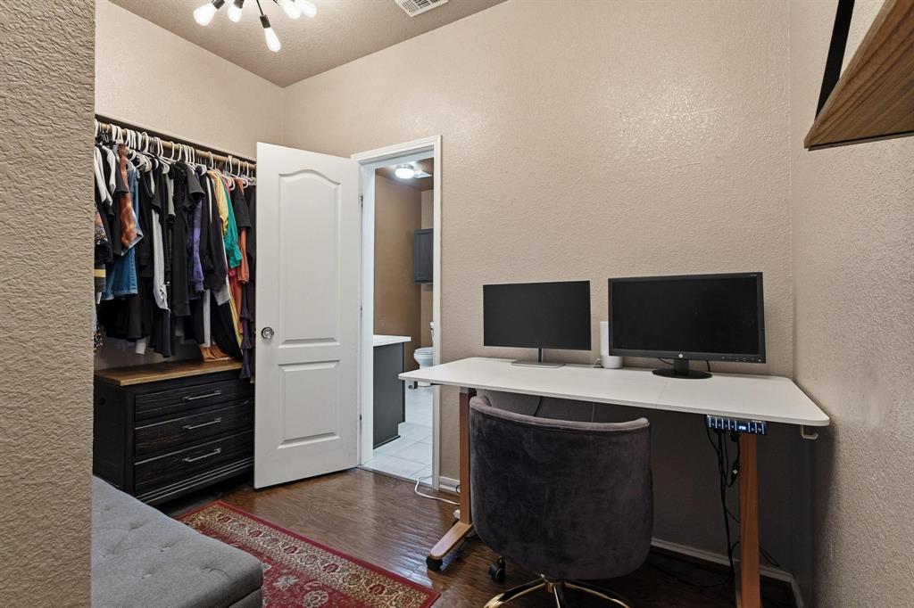 5513 Wharfside Place Denton, TX 76208 - Photo 31 of 37 a view of a workspace with furniture