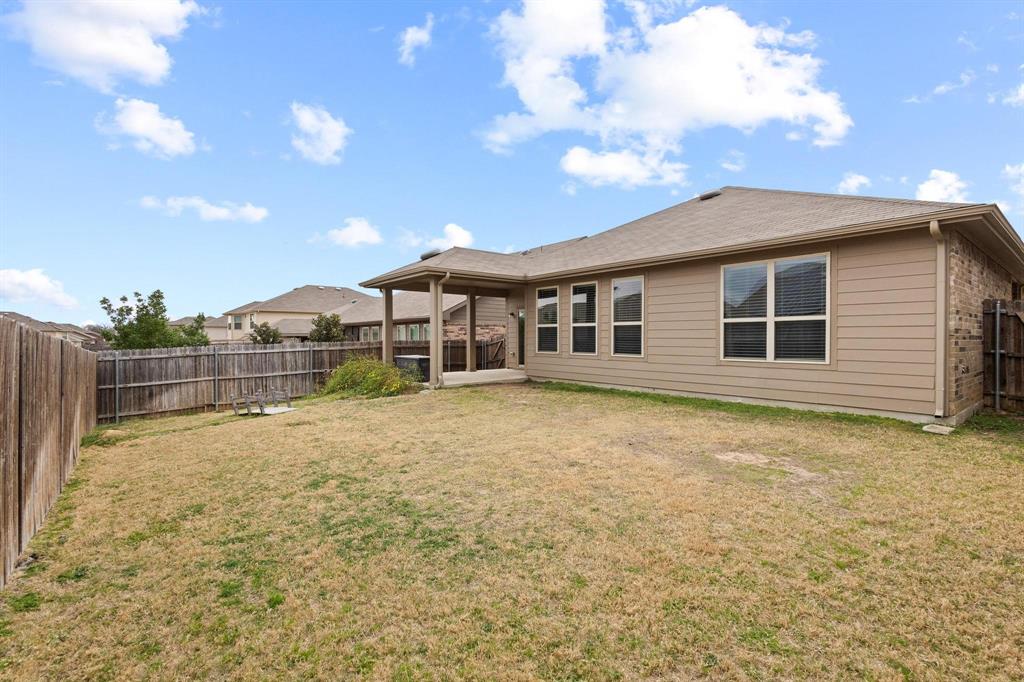 5513 Wharfside Place Denton, TX 76208 - Photo 35 of 37 a backyard of a house