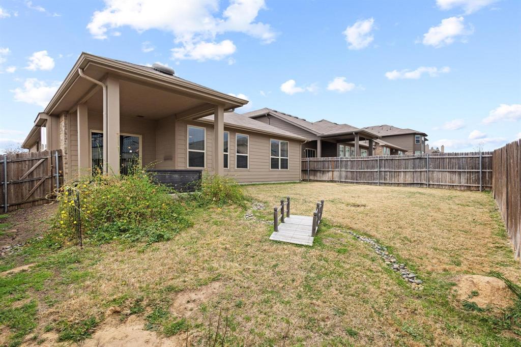 5513 Wharfside Place Denton, TX 76208 - Photo 36 of 37 a front view of a house with a yard