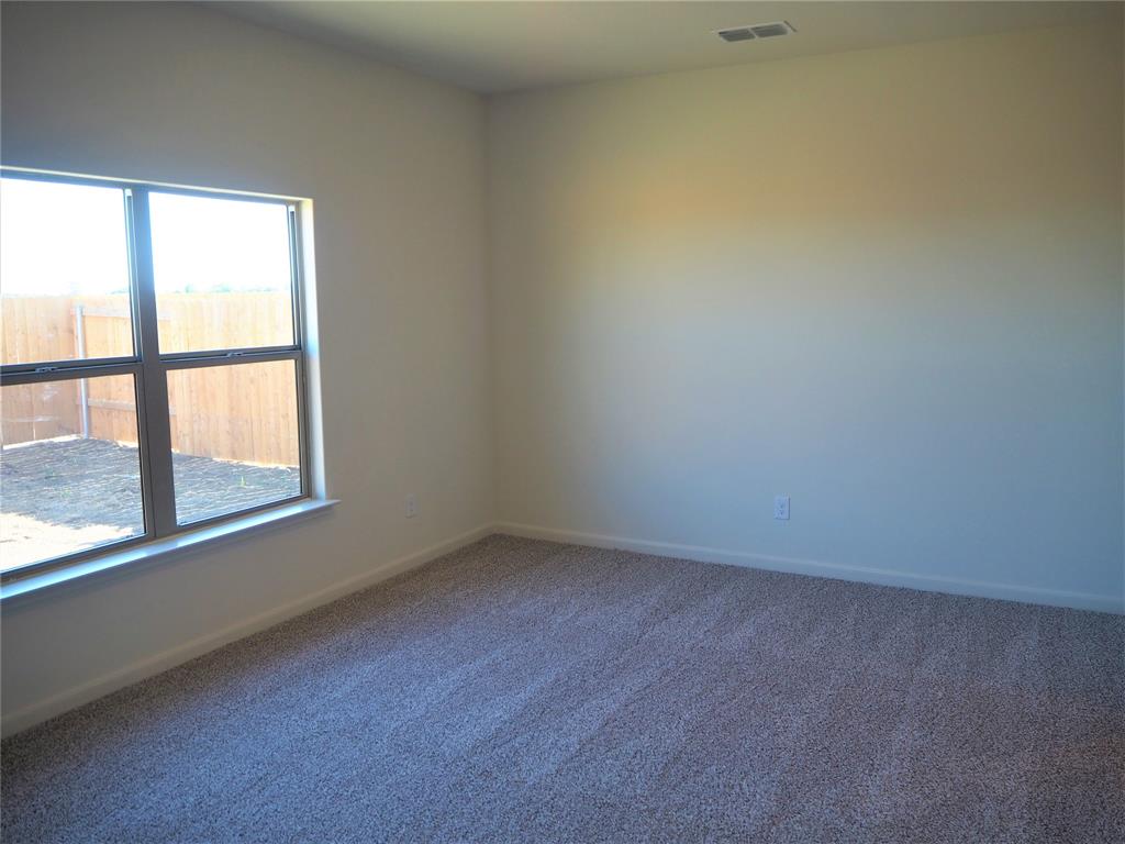 13612 Musselshell Drive Ponder, TX 76259 - Photo 12 of 39 an empty room with a window