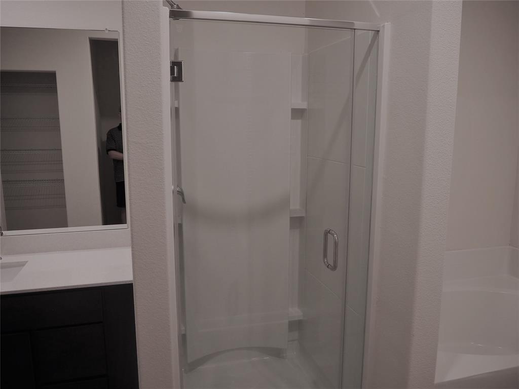 13612 Musselshell Drive Ponder, TX 76259 - Photo 16 of 39 a bathroom with a shower and a sink