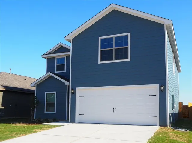 a house view with a backyard space