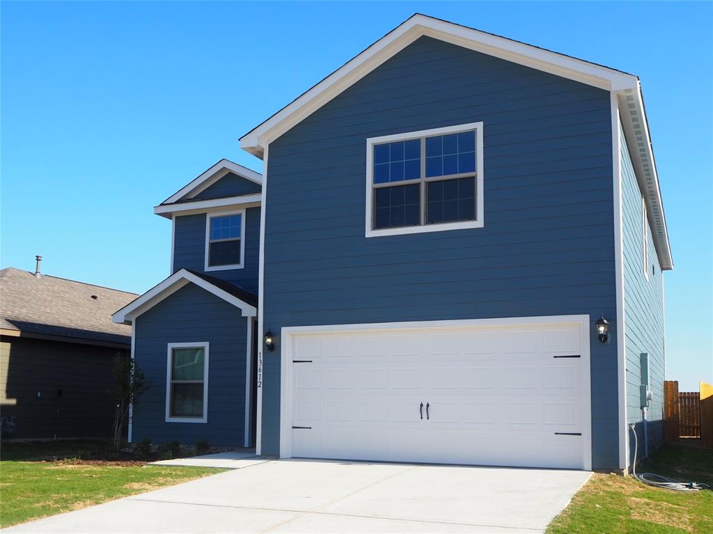 13612 Musselshell Drive Ponder, TX 76259 - Photo 3 of 39 a house view with a backyard space