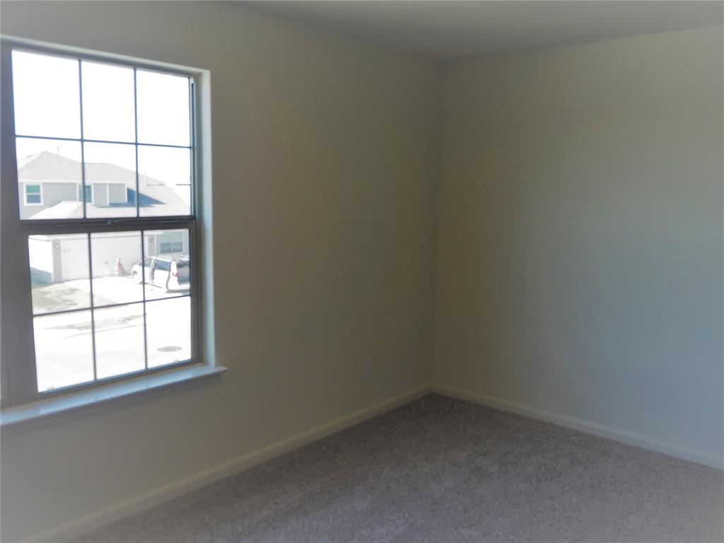 13612 Musselshell Drive Ponder, TX 76259 - Photo 32 of 39 an empty room with a window