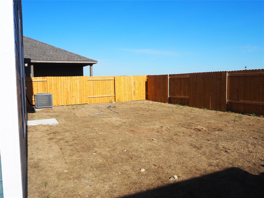 13612 Musselshell Drive Ponder, TX 76259 - Photo 38 of 39 a view of a backyard