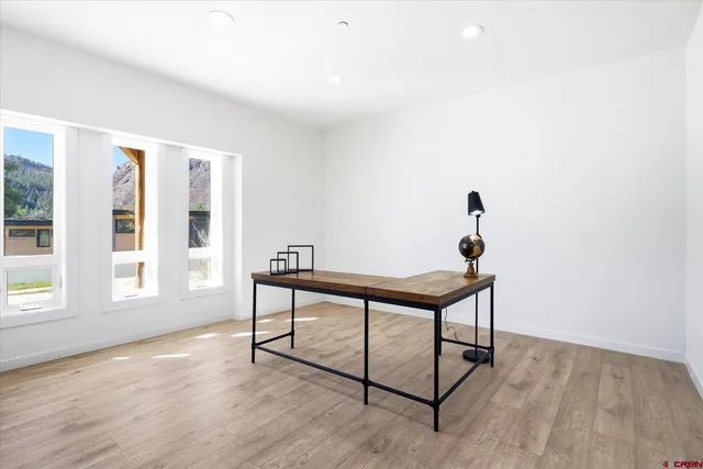 a view of wooden floor and workspace