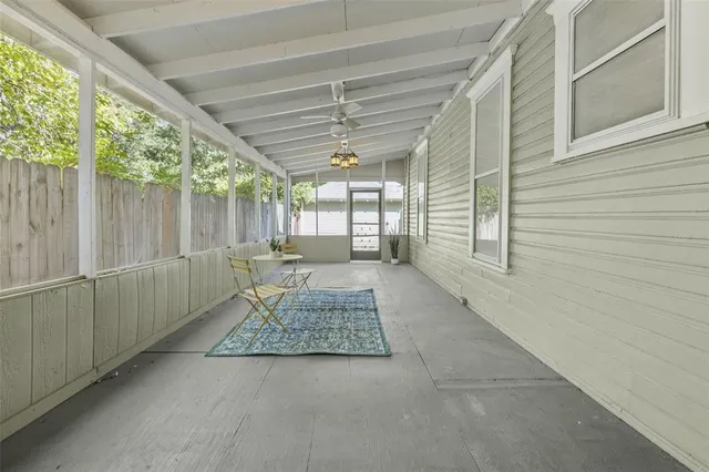 a living room with a rug