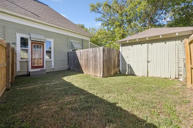 a view of a backyard with a garden