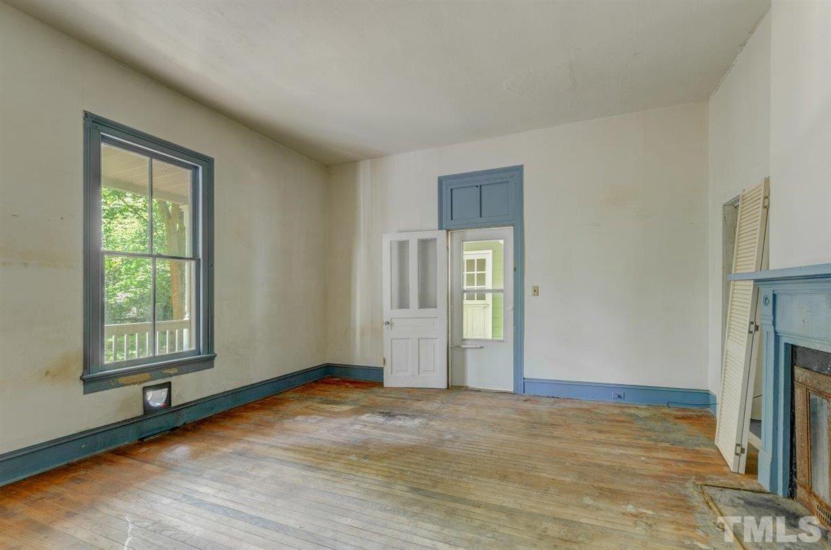 5816 Old Stage Road Raleigh, NC 27603 - Photo 18 of 30 a view of an empty room with a window