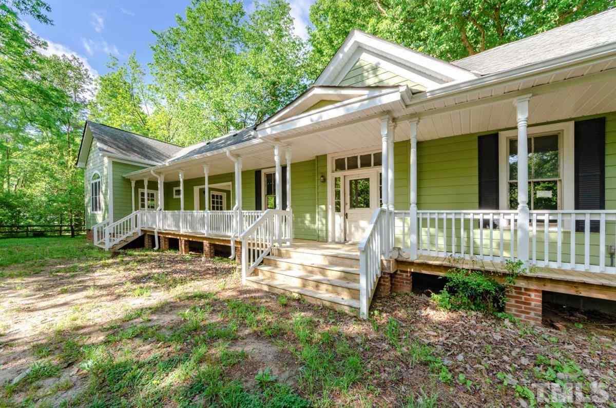 5816 Old Stage Road Raleigh, NC 27603 - Photo 3 of 30 a view of a house with a yard and deck
