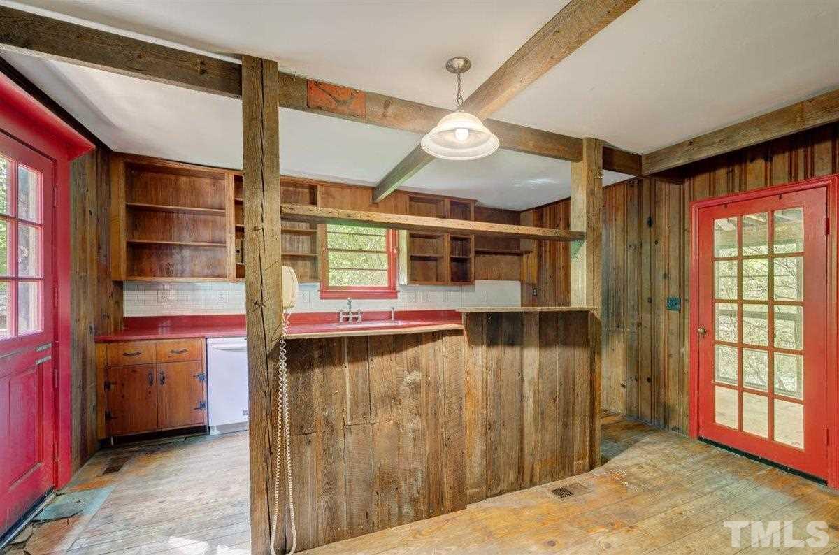 5816 Old Stage Road Raleigh, NC 27603 - Photo 23 of 30 a view of a room with rack and furniture