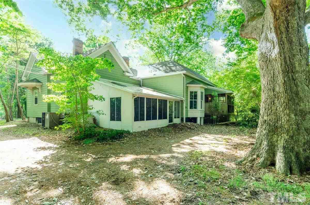 5816 Old Stage Road Raleigh, NC 27603 - Photo 28 of 30 a view of a house with yard and a garden