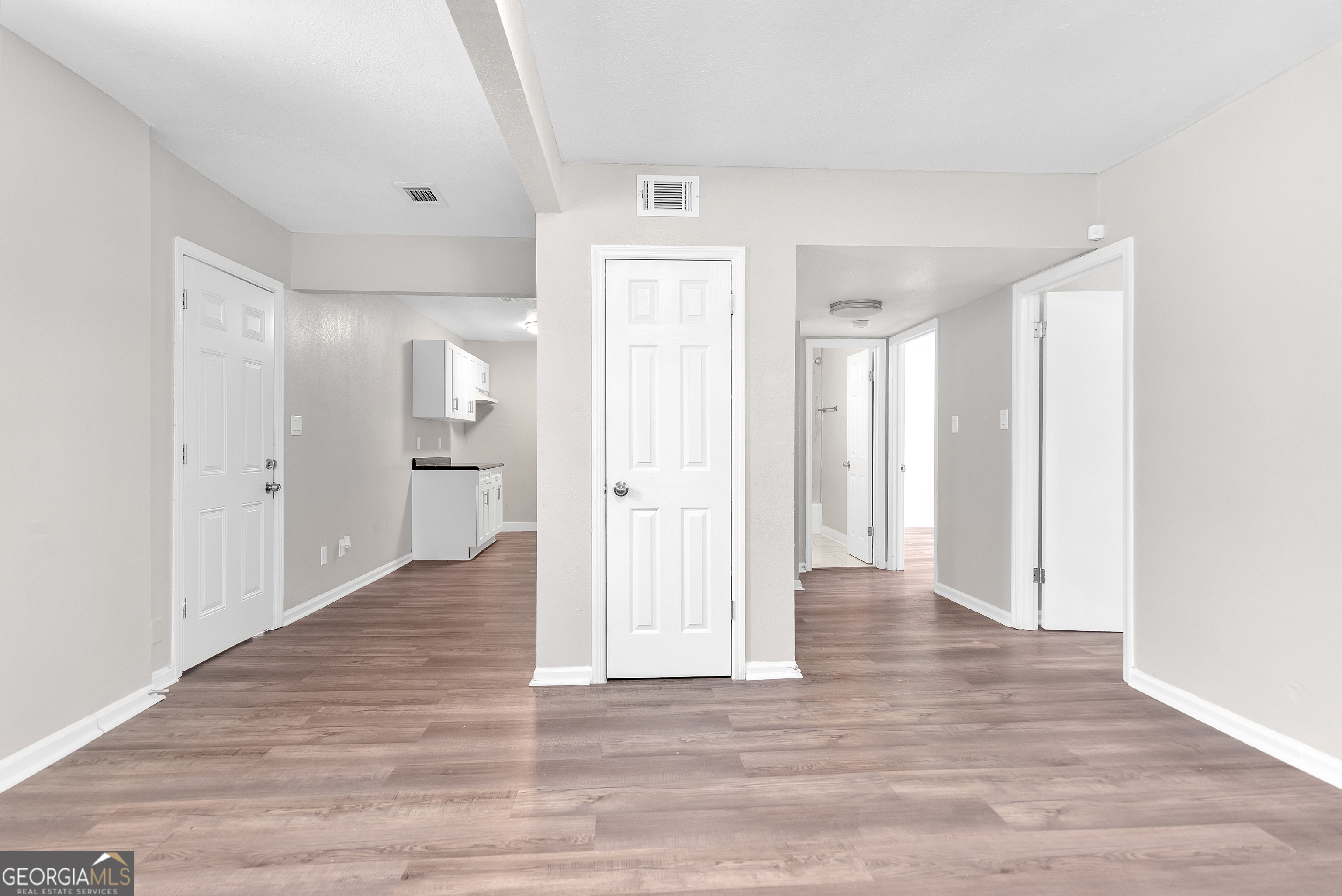 110 3rd Street Augusta, GA 30901 - Photo 14 of 16 a view of a hallway with wooden floor