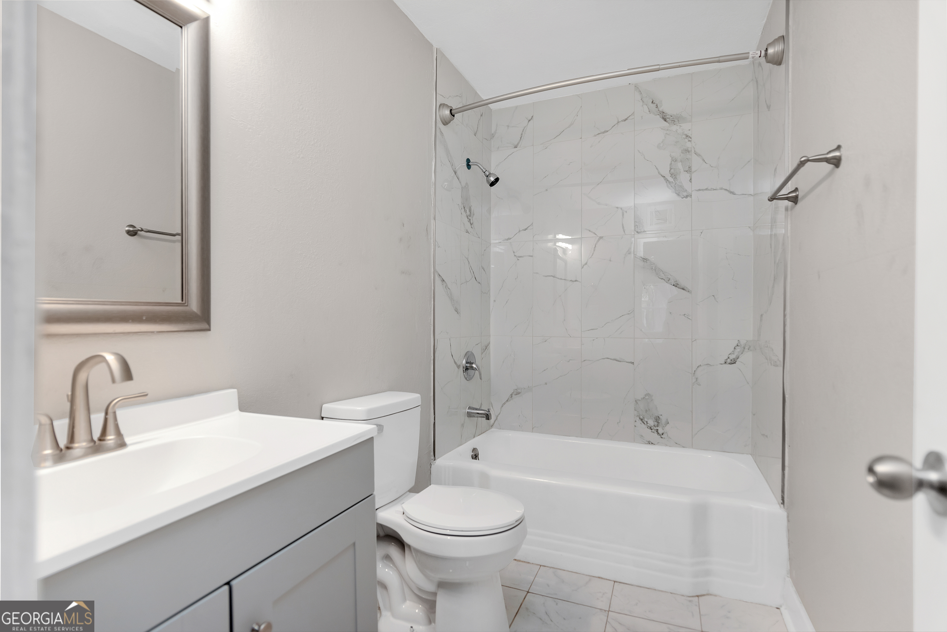110 3rd Street Augusta, GA 30901 - Photo 8 of 16 a bathroom with a sink toilet and shower