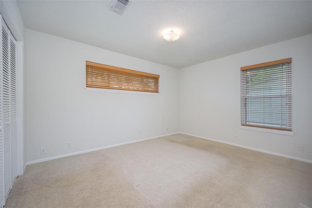 1027 Stanley Street Denton, TX 76201 - Photo 21 of 38 PRIMARY BEDROOM RETREAT~