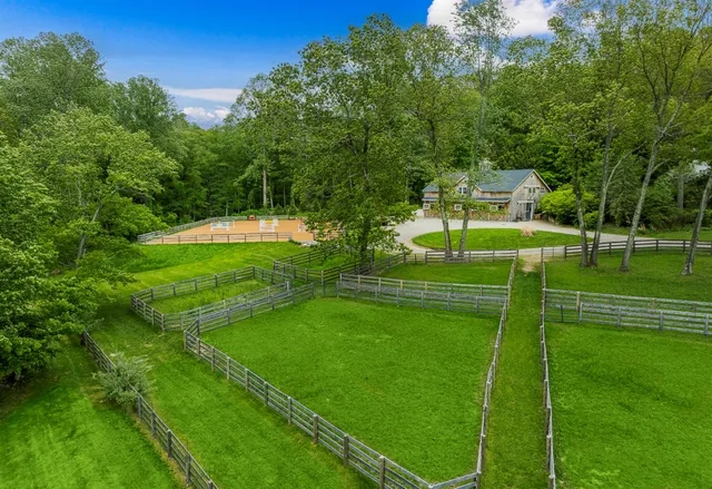 a view of a park with houses