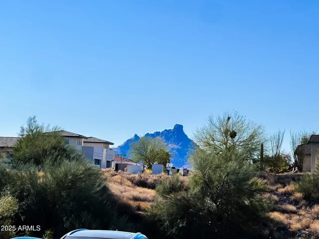 a view of a street with cars