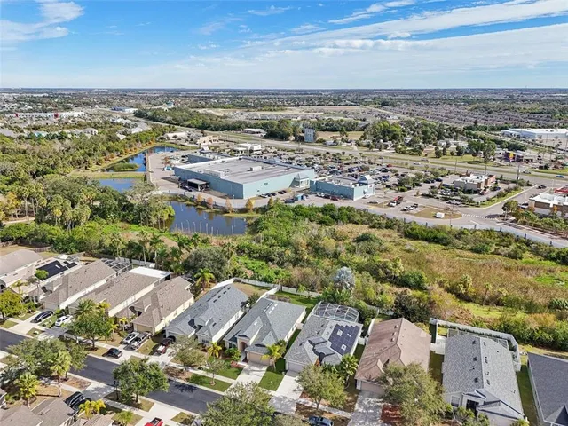 an aerial view of a building with outdoor space