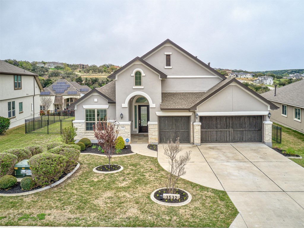 a front view of a house with entertaining space