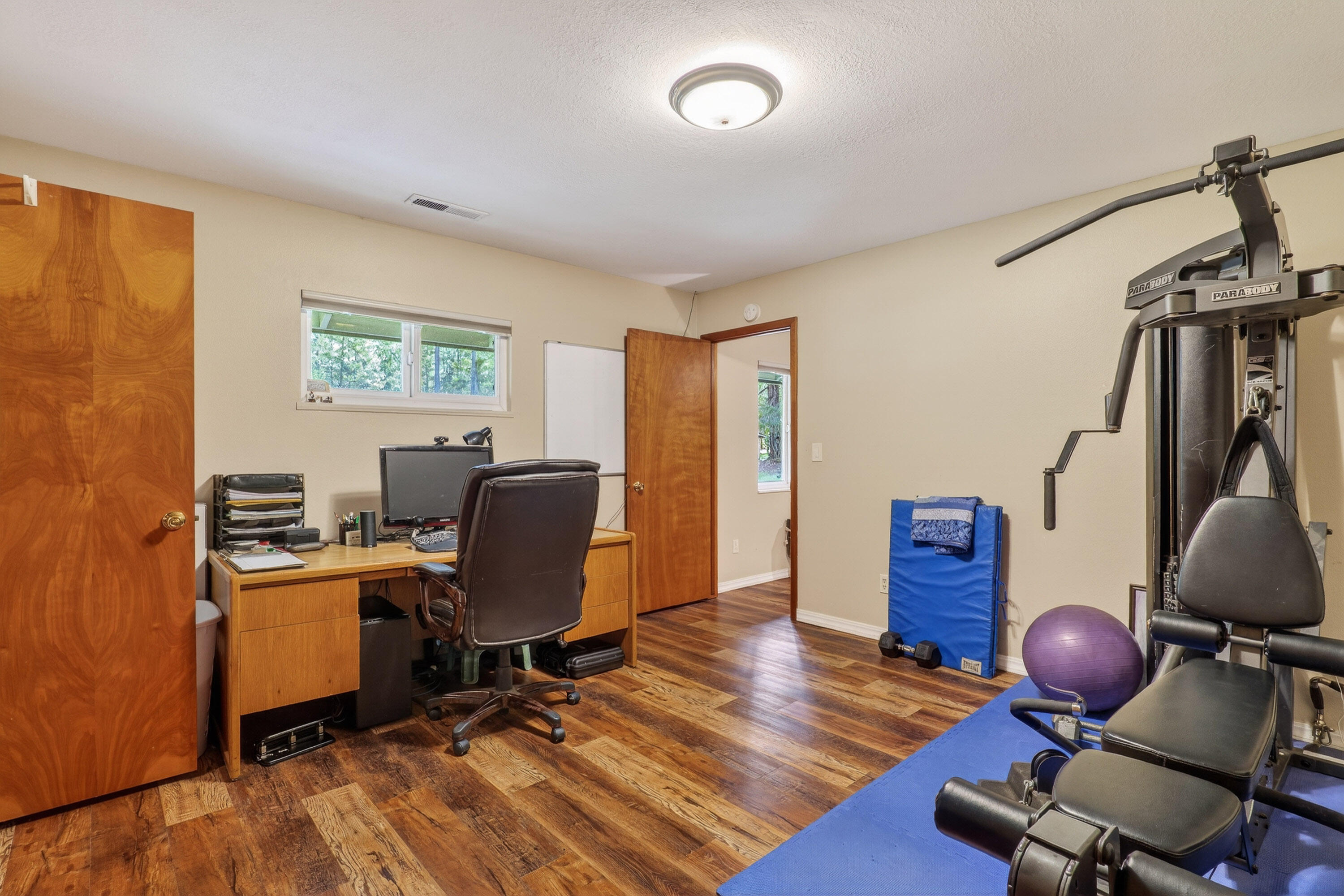 244 Riessen Road Grants Pass, OR 97526 - Photo 26 of 52 a view of a workspace with furniture and a window