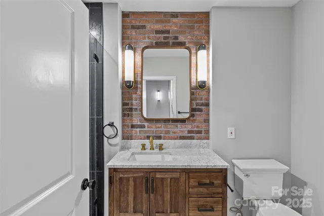a view of swimming pool with outdoor seating and plants