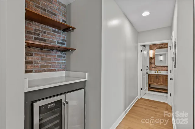 a kitchen with a counter space a sink and appliances