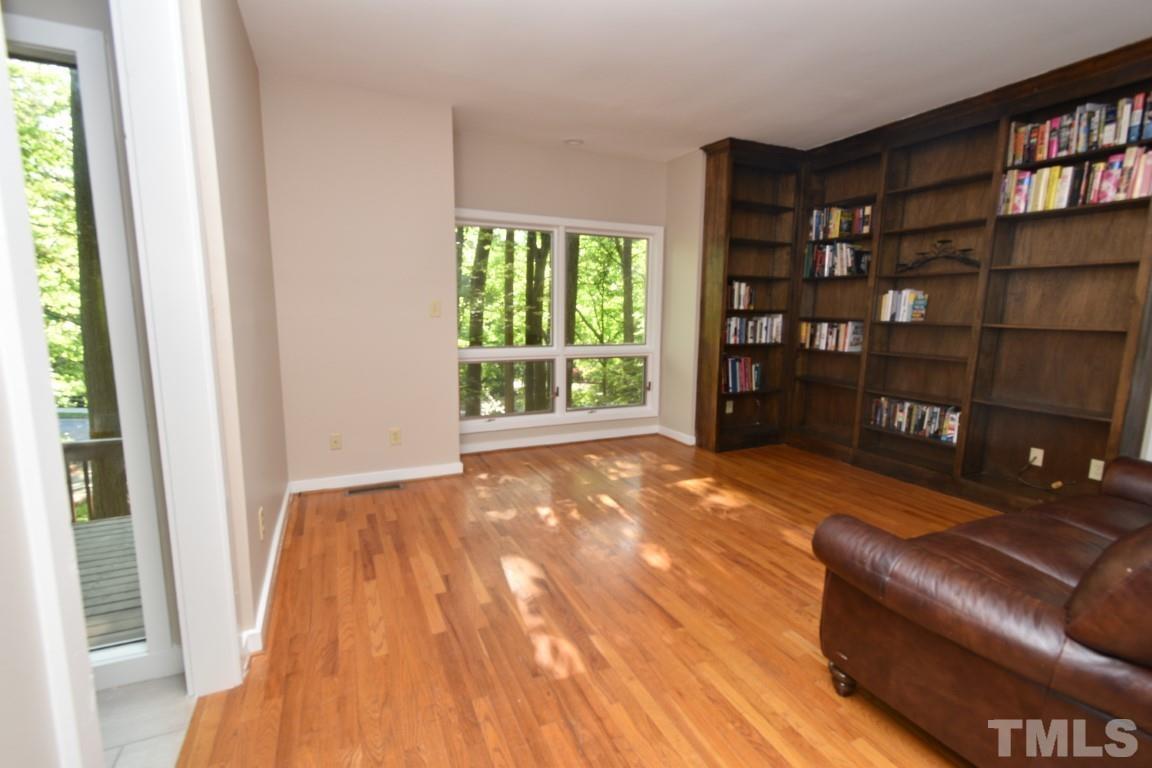 408 Constitution Drive Durham, NC 27705 - Photo 14 of 39 a view of livingroom with furniture and staircase