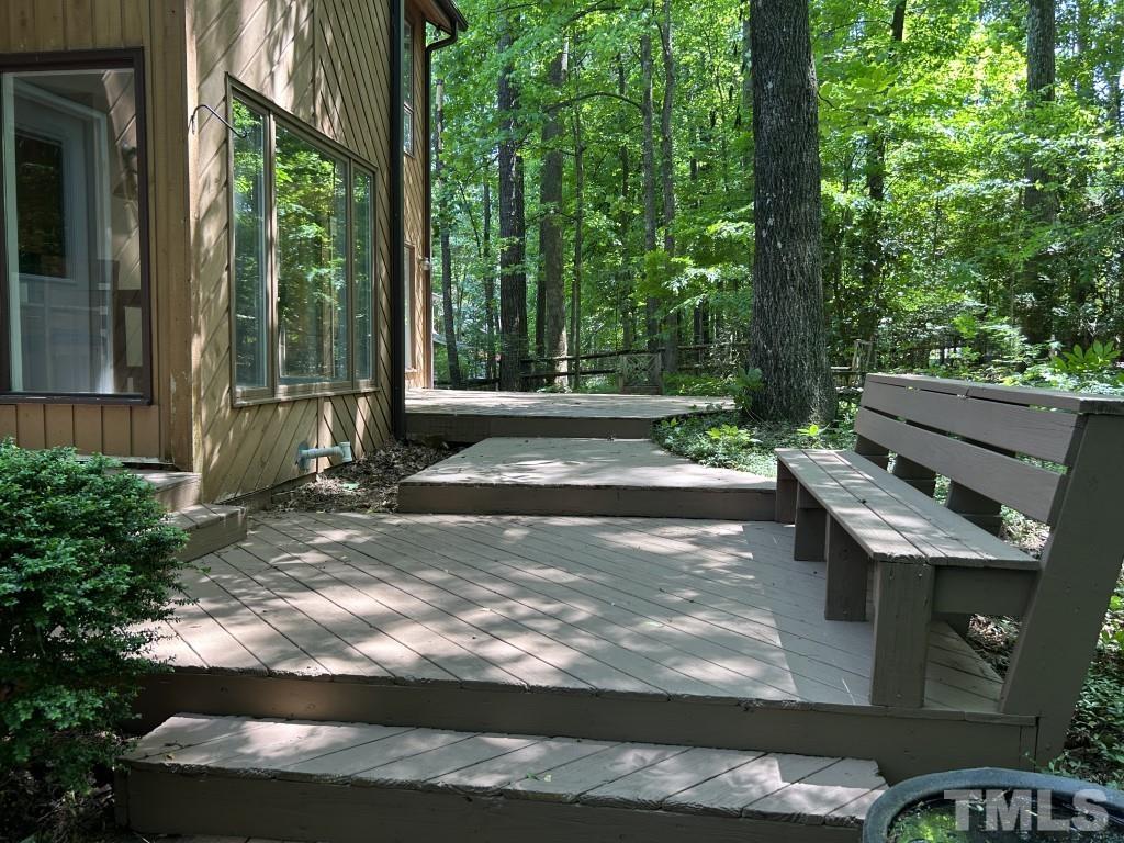 408 Constitution Drive Durham, NC 27705 - Photo 37 of 39 a view of a backyard with sitting area