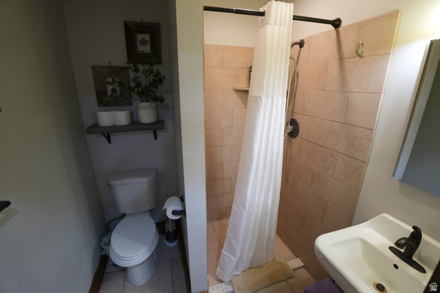 3711 North Canyon Road Provo, UT 84604 - Photo 16 of 42 Full bath featuring a shower stall and tile patterned floors