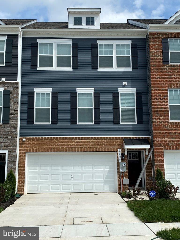 a view of brick building with many windows