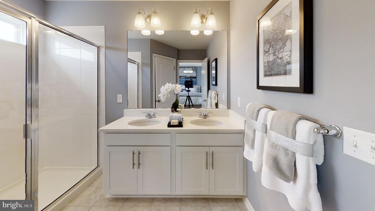 2113 Ruby Turn Bowie, MD 20721 - Photo 20 of 48 a bathroom with a sink and a mirror