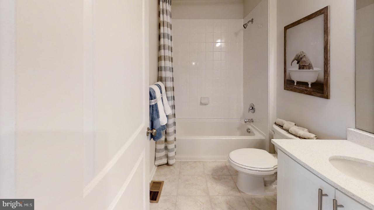 2113 Ruby Turn Bowie, MD 20721 - Photo 22 of 48 a bathroom with a toilet and a shower