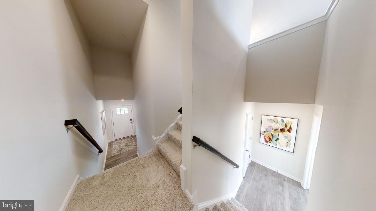 2113 Ruby Turn Bowie, MD 20721 - Photo 24 of 48 a view of a hallway with staircase